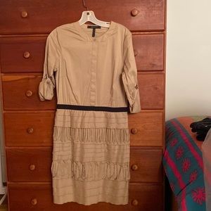 Bcbg tan cotton dress with pleating on skirt. Roll up sleeves.